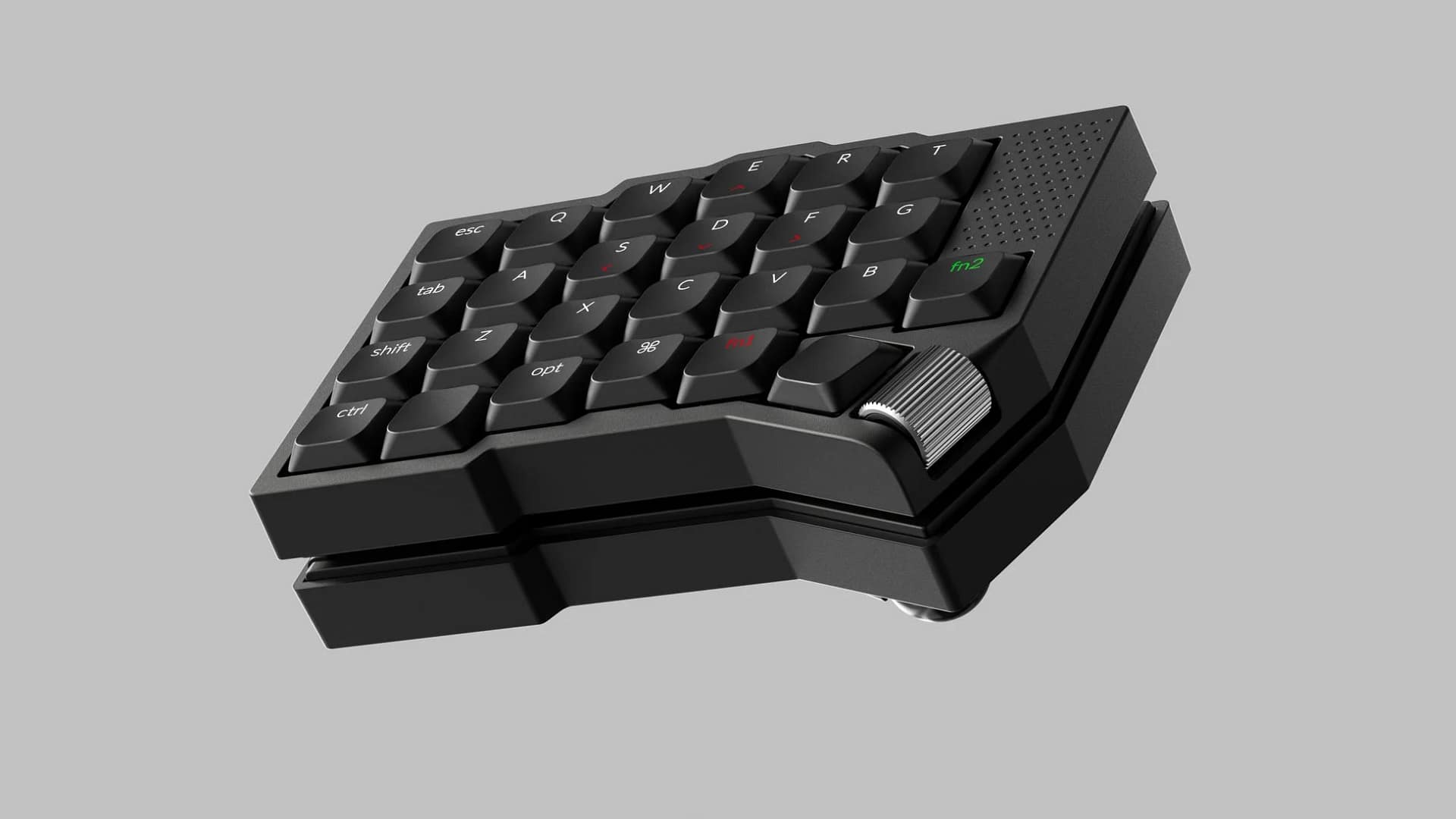 グレーの背景に、黒いコンパクトなキーボードが置かれています。